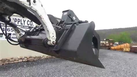 quick attach close up on bobcat skid steer video|bobcat grapple attachment instructions.